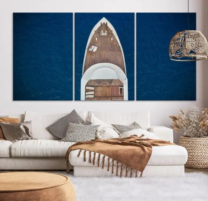 The Boat on the Sea Wall Art Canvas Print, depicting an aerial view of a yacht on ocean water, adds elegance to any room. This triptych is crafted on museum-quality canvas, ready to hang, and includes a UV-protective coating for enduring vibrancy.