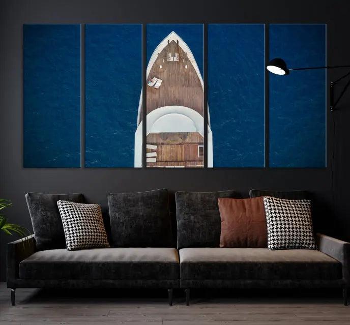 The Boat on the Sea Wall Art Canvas Print, depicting an aerial view of a yacht on ocean water, adds elegance to any room. This triptych is crafted on museum-quality canvas, ready to hang, and includes a UV-protective coating for enduring vibrancy.