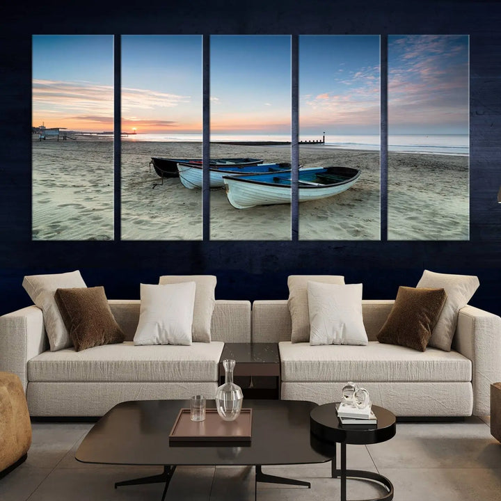 The "Boats On The Beach Wall Art Canvas Print," featuring a triptych photo of boats at sunset, is printed on museum-quality canvas with a UV-protective coating.