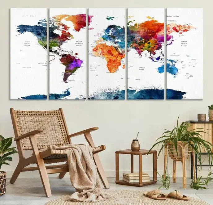A bold and colorful world map from the "Bold & Colorful World Map Multi-Panel Framed Canvas Print" collection adorns three panels in a modern room. This ready-to-hang art piece infuses vibrant charm into any space.