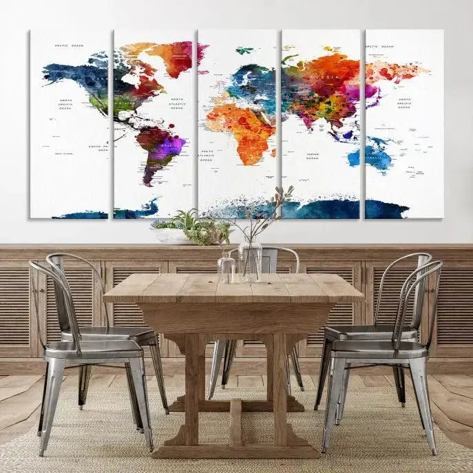 A bold and colorful world map from the "Bold & Colorful World Map Multi-Panel Framed Canvas Print" collection adorns three panels in a modern room. This ready-to-hang art piece infuses vibrant charm into any space.