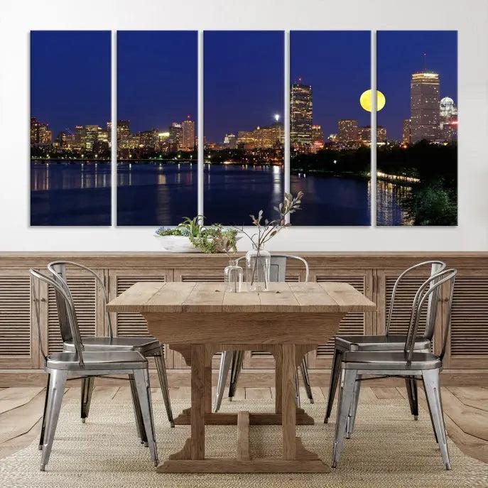 The "Boston City Lights Full Moon Night Skyline Cityscape View Wall Art Canvas Print" is a captivating triptych featuring a city skyline at night with a large moon. Crafted on museum-quality canvases, each piece is ready to hang and includes UV-protective coating to preserve its vibrant allure.