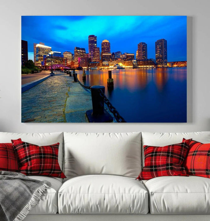 The "Boston City Lights Night Blue Skyline Cityscape" is a stunning large wall art of a city skyline at dusk, printed on museum-quality canvas with a UV-protective coating. It is ready to hang and can instantly transform your space.