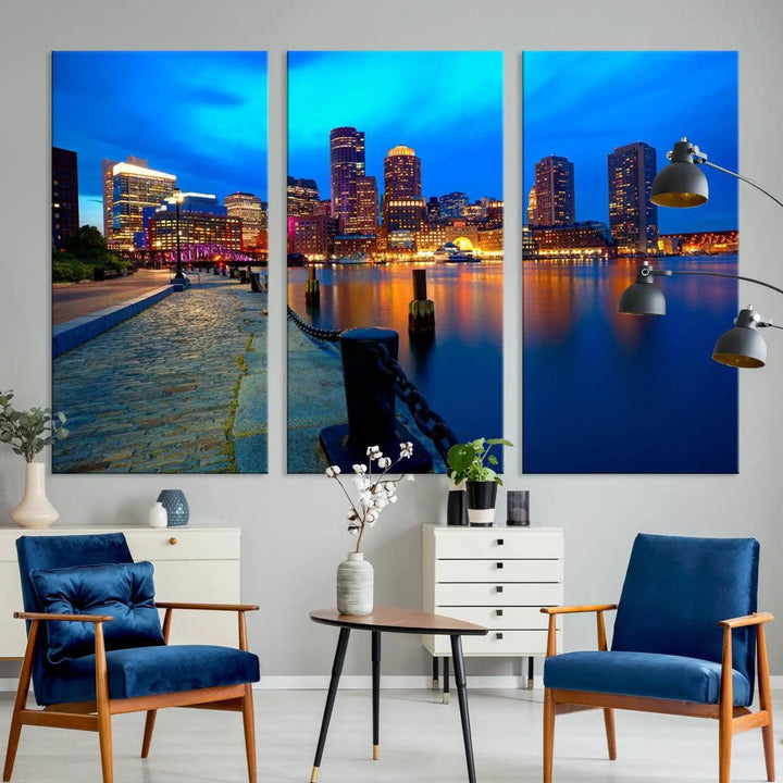 The "Boston City Lights Night Blue Skyline Cityscape" is a stunning large wall art of a city skyline at dusk, printed on museum-quality canvas with a UV-protective coating. It is ready to hang and can instantly transform your space.