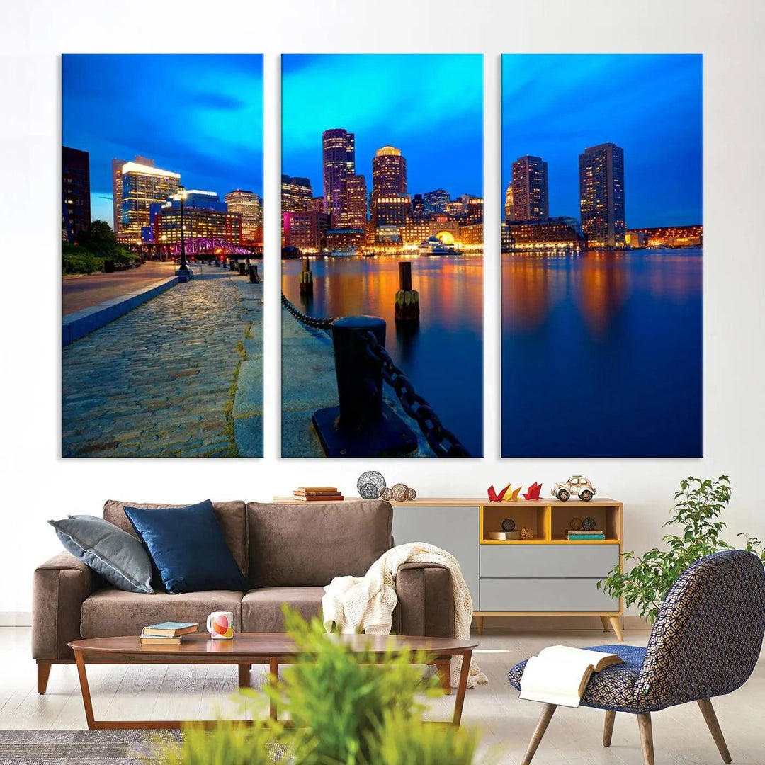 The "Boston City Lights Night Blue Skyline Cityscape" is a stunning large wall art of a city skyline at dusk, printed on museum-quality canvas with a UV-protective coating. It is ready to hang and can instantly transform your space.