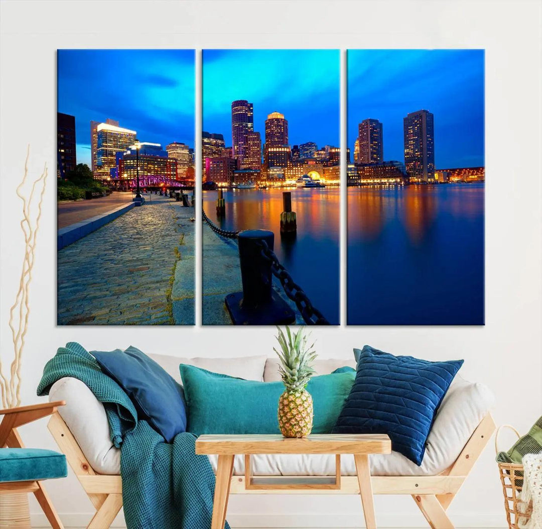 The "Boston City Lights Night Blue Skyline Cityscape" is a stunning large wall art of a city skyline at dusk, printed on museum-quality canvas with a UV-protective coating. It is ready to hang and can instantly transform your space.