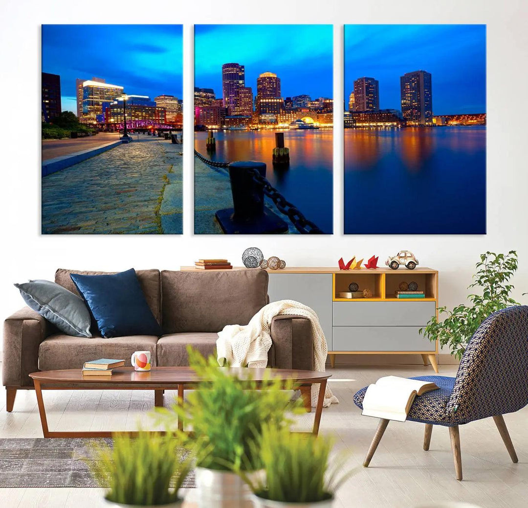 The "Boston City Lights Night Blue Skyline Cityscape" is a stunning large wall art of a city skyline at dusk, printed on museum-quality canvas with a UV-protective coating. It is ready to hang and can instantly transform your space.