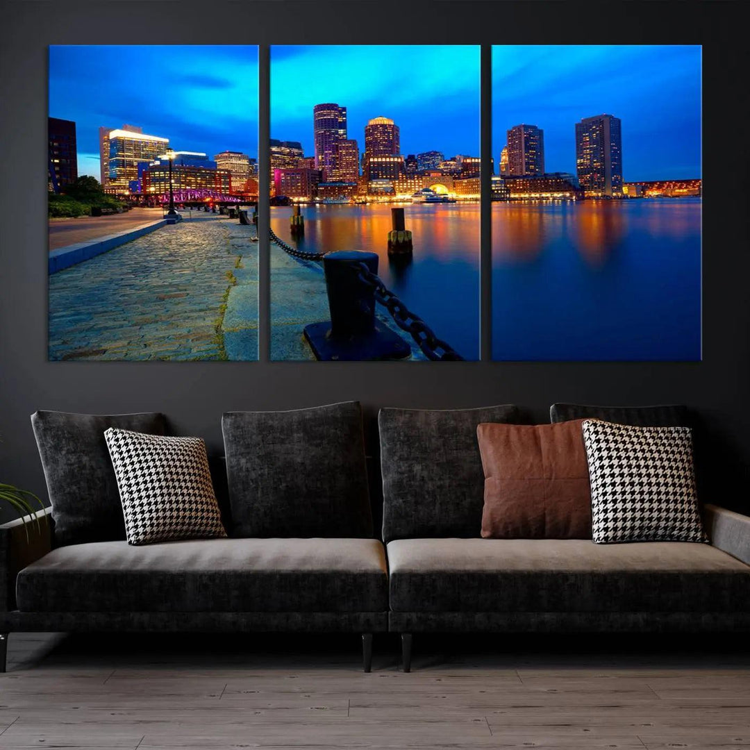 The "Boston City Lights Night Blue Skyline Cityscape" is a stunning large wall art of a city skyline at dusk, printed on museum-quality canvas with a UV-protective coating. It is ready to hang and can instantly transform your space.