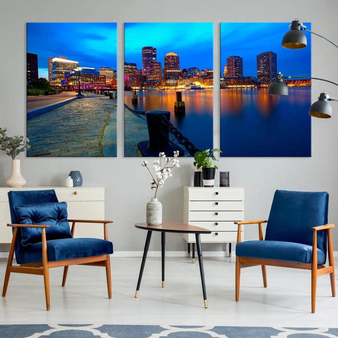 The "Boston City Lights Night Blue Skyline Cityscape" is a stunning large wall art of a city skyline at dusk, printed on museum-quality canvas with a UV-protective coating. It is ready to hang and can instantly transform your space.