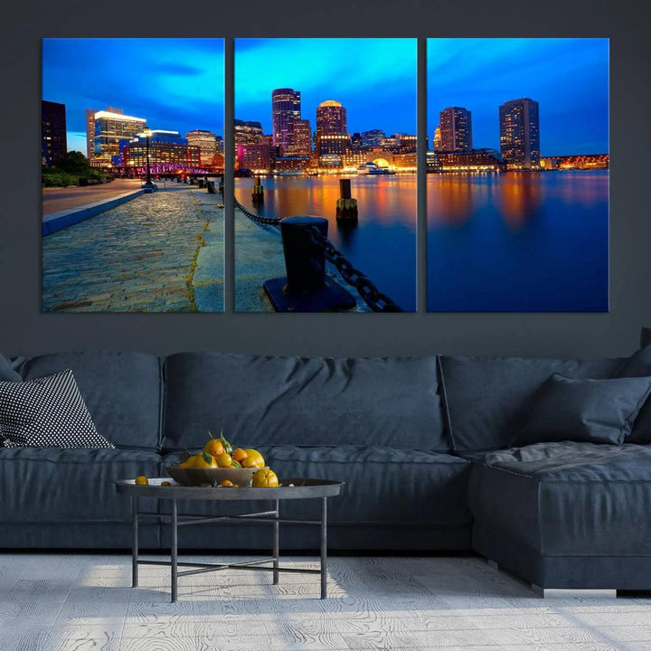 The "Boston City Lights Night Blue Skyline Cityscape" is a stunning large wall art of a city skyline at dusk, printed on museum-quality canvas with a UV-protective coating. It is ready to hang and can instantly transform your space.