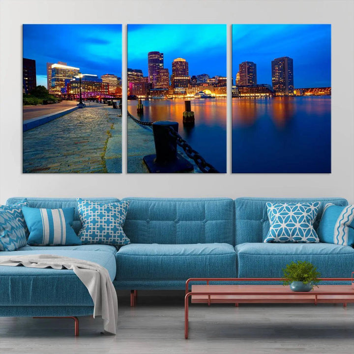 The "Boston City Lights Night Blue Skyline Cityscape" is a stunning large wall art of a city skyline at dusk, printed on museum-quality canvas with a UV-protective coating. It is ready to hang and can instantly transform your space.