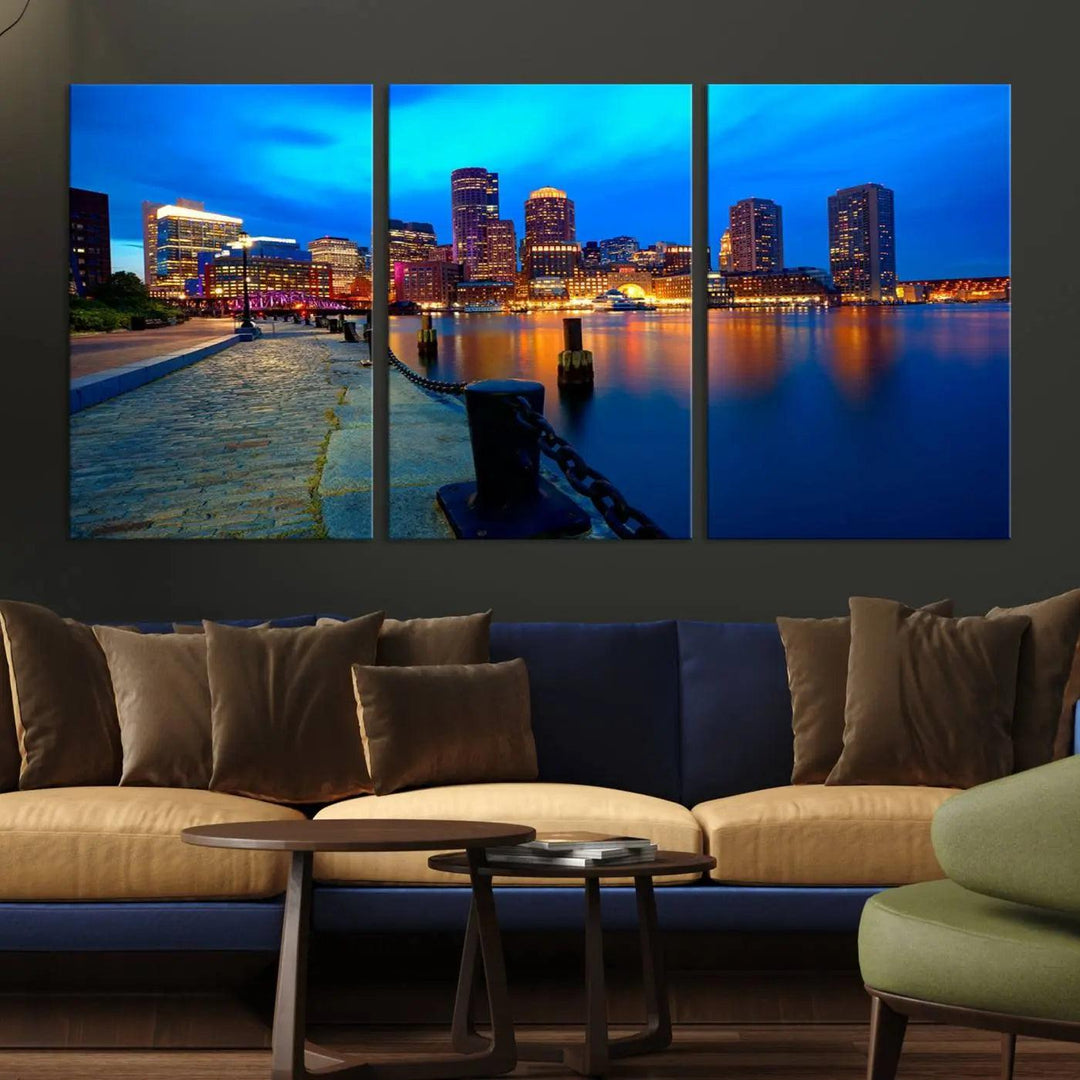 The "Boston City Lights Night Blue Skyline Cityscape" is a stunning large wall art of a city skyline at dusk, printed on museum-quality canvas with a UV-protective coating. It is ready to hang and can instantly transform your space.