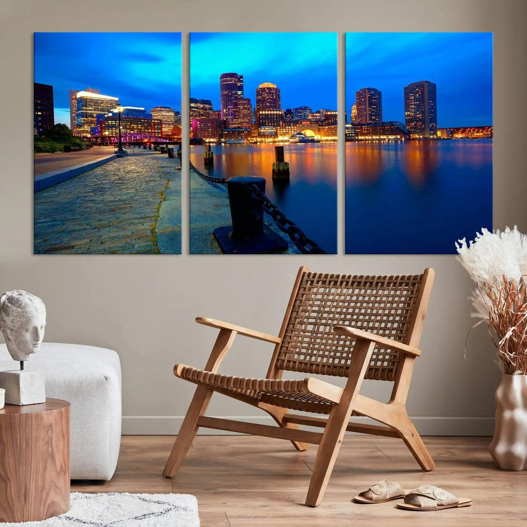 The "Boston City Lights Night Blue Skyline Cityscape" is a stunning large wall art of a city skyline at dusk, printed on museum-quality canvas with a UV-protective coating. It is ready to hang and can instantly transform your space.