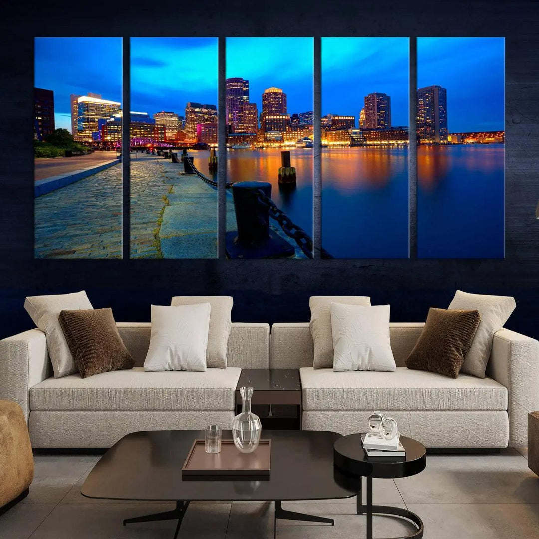 The "Boston City Lights Night Blue Skyline Cityscape" is a stunning large wall art of a city skyline at dusk, printed on museum-quality canvas with a UV-protective coating. It is ready to hang and can instantly transform your space.