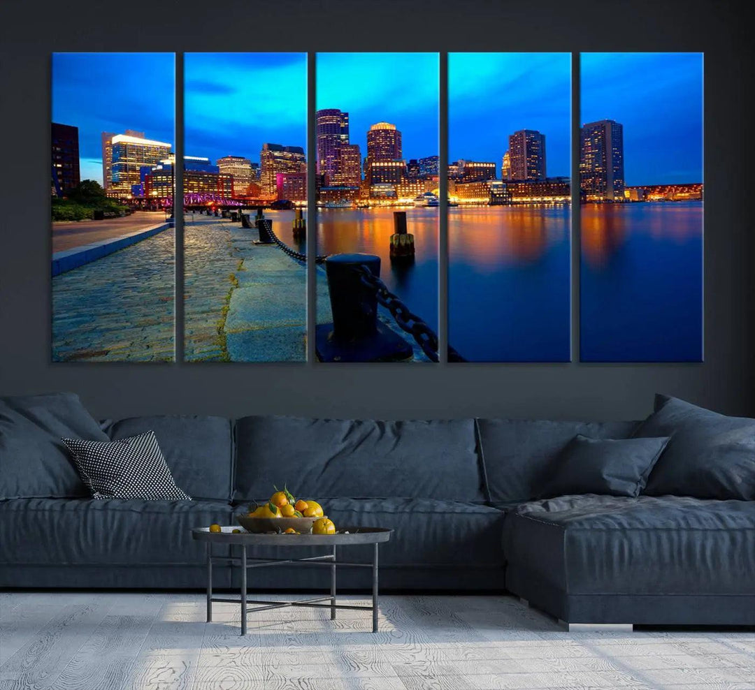 The "Boston City Lights Night Blue Skyline Cityscape" is a stunning large wall art of a city skyline at dusk, printed on museum-quality canvas with a UV-protective coating. It is ready to hang and can instantly transform your space.