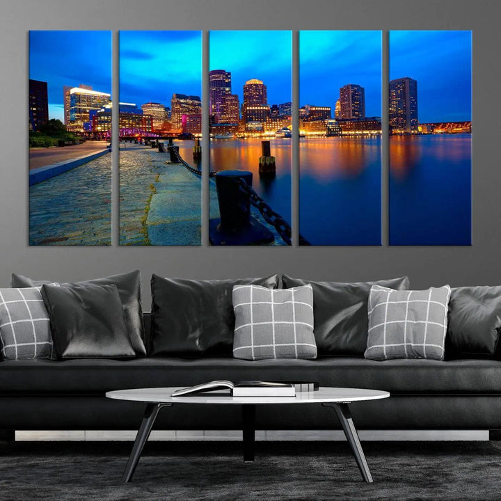 The "Boston City Lights Night Blue Skyline Cityscape" is a stunning large wall art of a city skyline at dusk, printed on museum-quality canvas with a UV-protective coating. It is ready to hang and can instantly transform your space.