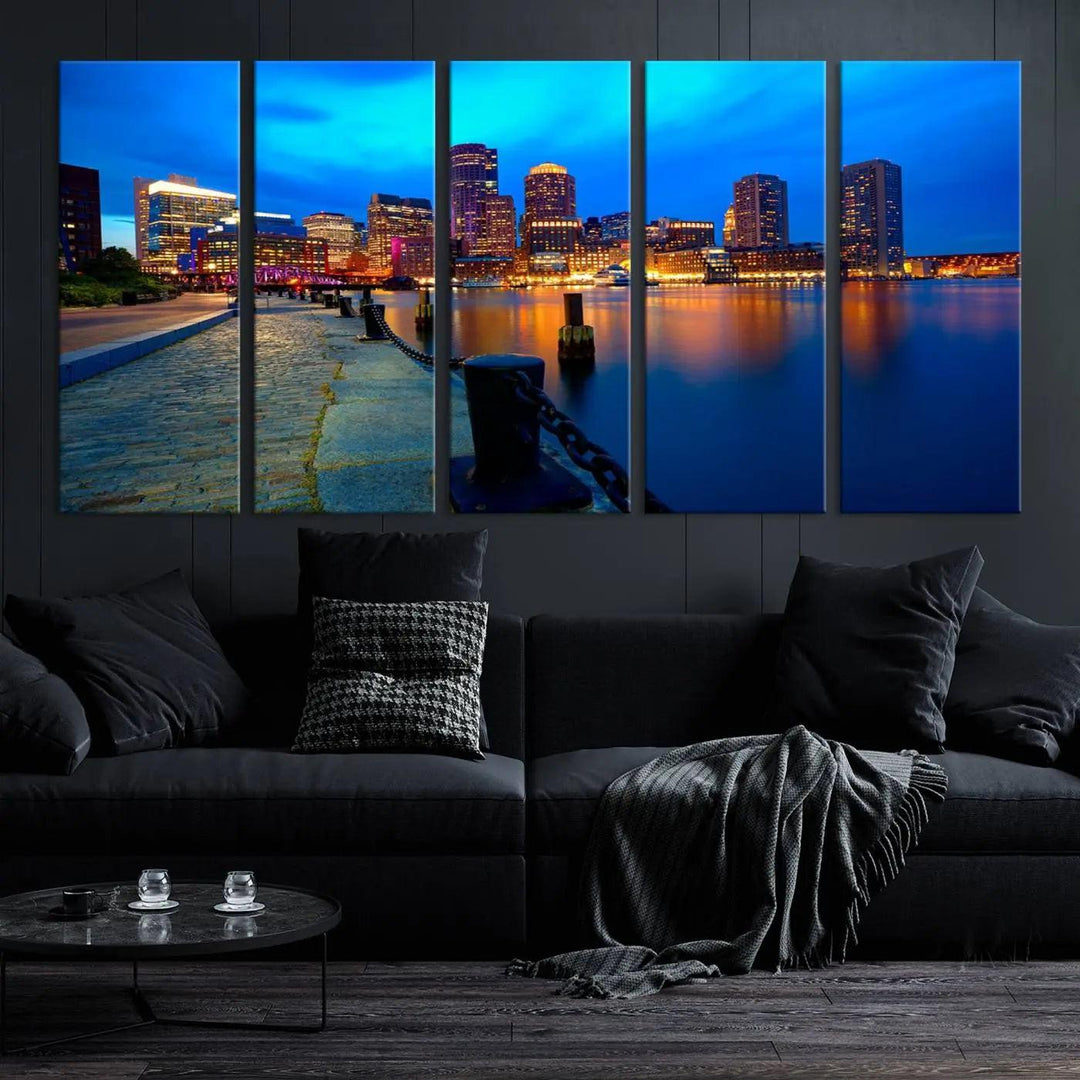 The "Boston City Lights Night Blue Skyline Cityscape" is a stunning large wall art of a city skyline at dusk, printed on museum-quality canvas with a UV-protective coating. It is ready to hang and can instantly transform your space.