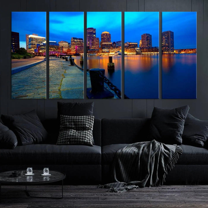 The "Boston City Lights Night Blue Skyline Cityscape" is a stunning large wall art of a city skyline at dusk, printed on museum-quality canvas with a UV-protective coating. It is ready to hang and can instantly transform your space.