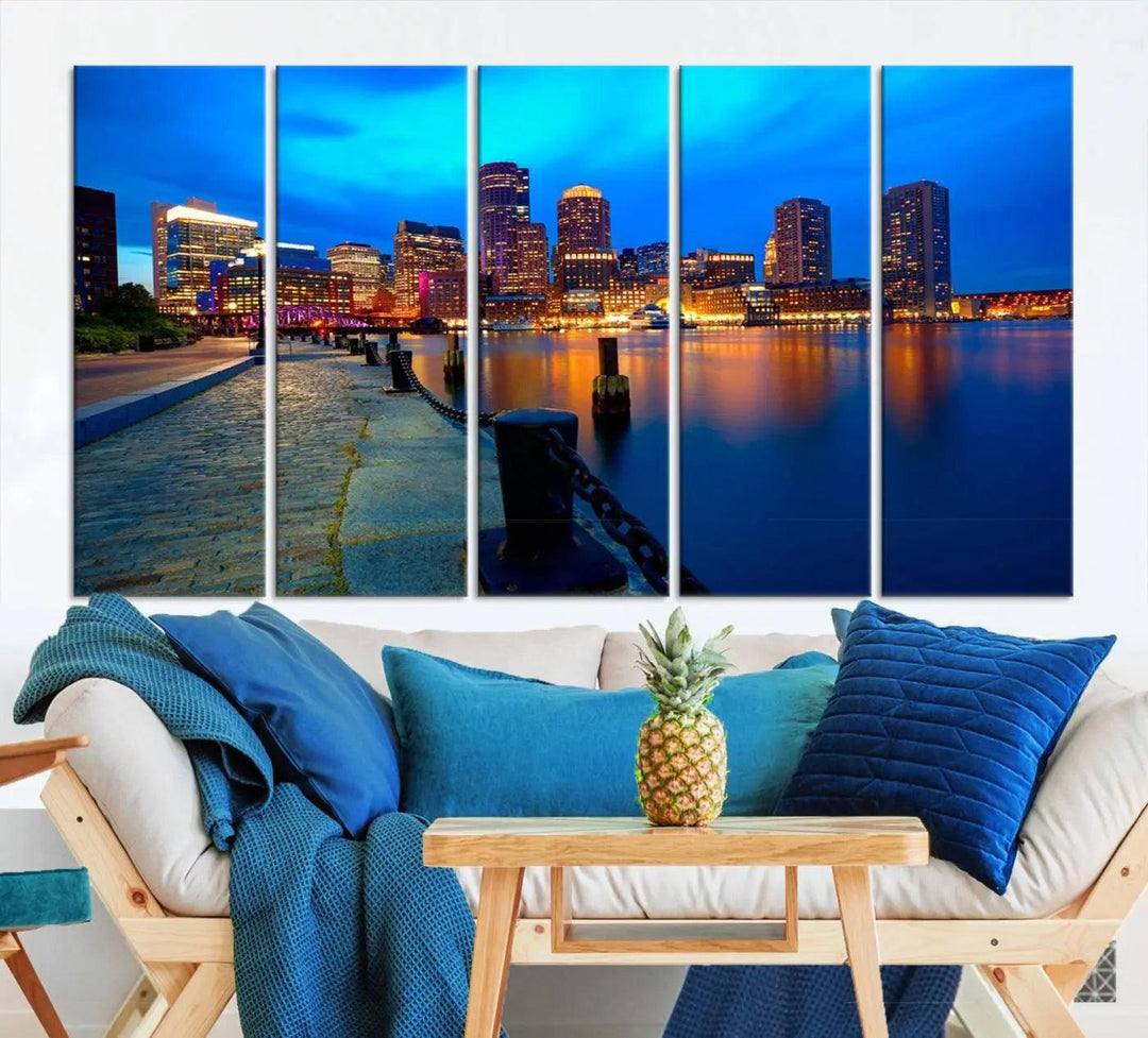 The "Boston City Lights Night Blue Skyline Cityscape" is a stunning large wall art of a city skyline at dusk, printed on museum-quality canvas with a UV-protective coating. It is ready to hang and can instantly transform your space.