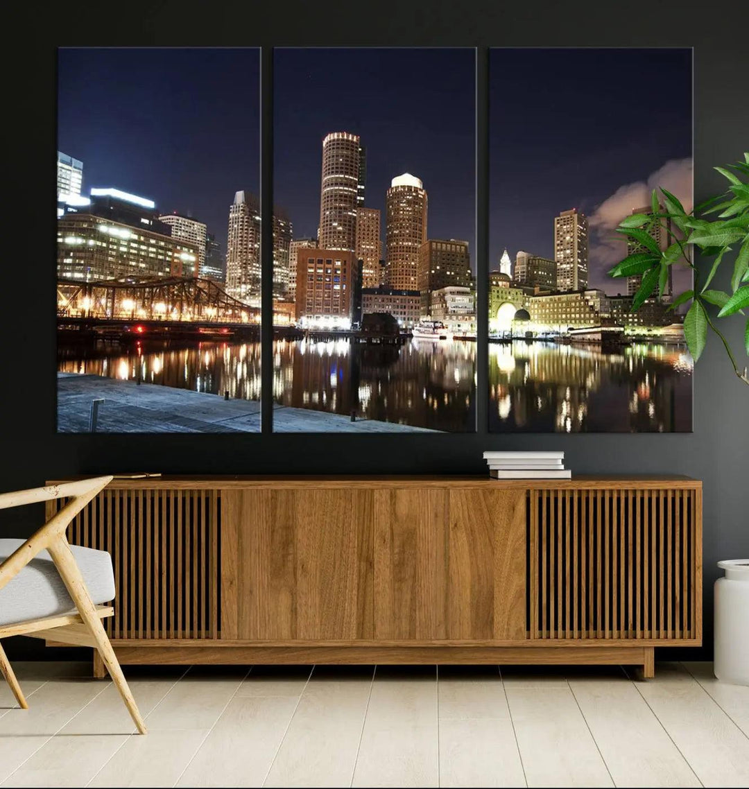 The Boston City Lights Skyline Cityscape View Wall Art Canvas Print showcases a nighttime cityscape on museum-quality canvas.