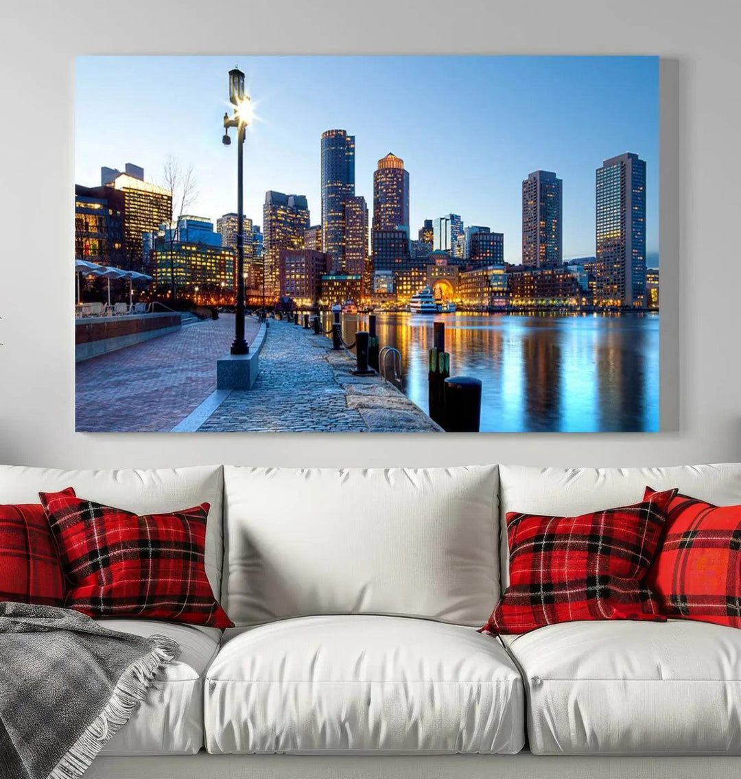 The modern living room features the Boston City Lights Sunrise Skyline Cityscape View Wall Art Canvas Print, crafted with museum-quality canvas and a UV-protective coating.