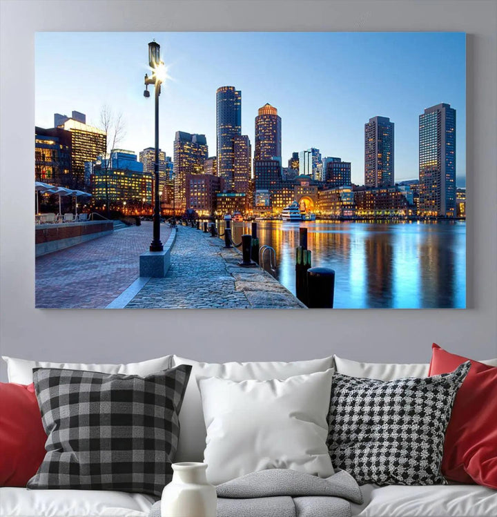 The modern living room features the Boston City Lights Sunrise Skyline Cityscape View Wall Art Canvas Print, crafted with museum-quality canvas and a UV-protective coating.