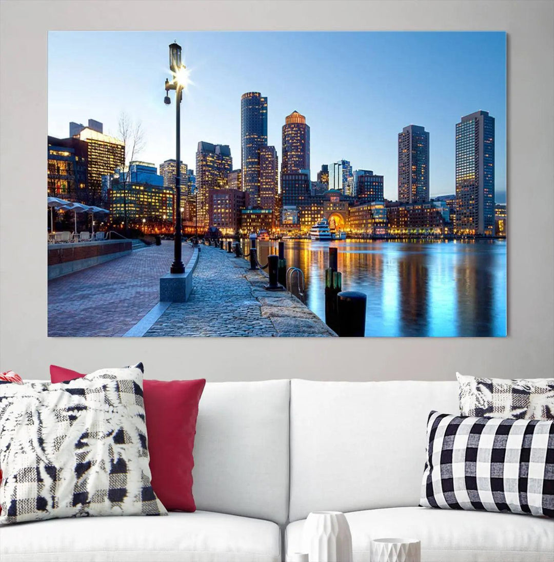 The modern living room features the Boston City Lights Sunrise Skyline Cityscape View Wall Art Canvas Print, crafted with museum-quality canvas and a UV-protective coating.