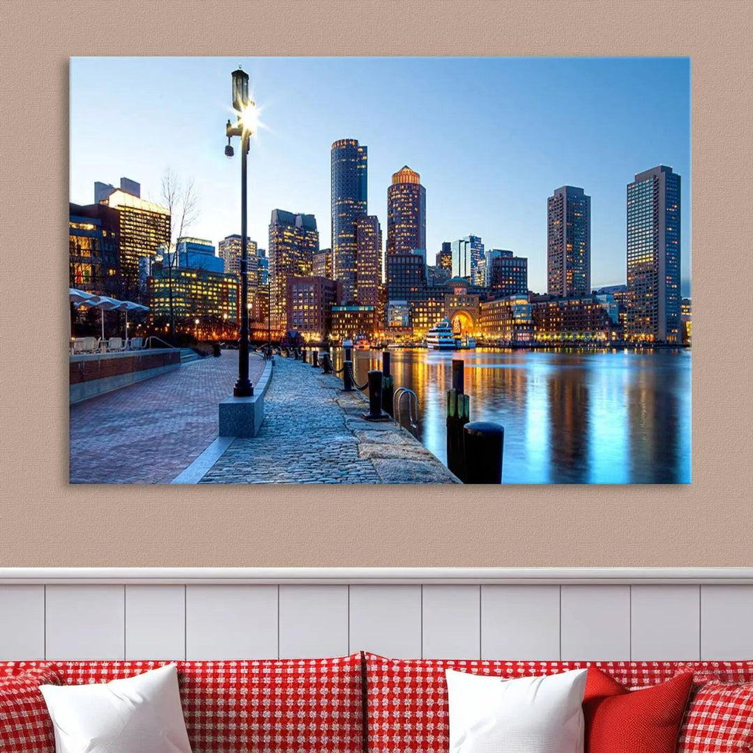 The modern living room features the Boston City Lights Sunrise Skyline Cityscape View Wall Art Canvas Print, crafted with museum-quality canvas and a UV-protective coating.