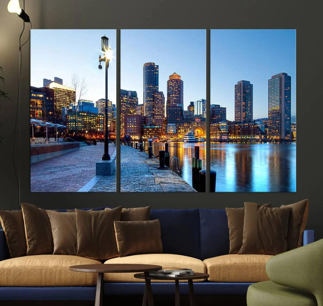 The modern living room features the Boston City Lights Sunrise Skyline Cityscape View Wall Art Canvas Print, crafted with museum-quality canvas and a UV-protective coating.