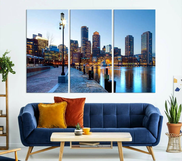 The modern living room features the Boston City Lights Sunrise Skyline Cityscape View Wall Art Canvas Print, crafted with museum-quality canvas and a UV-protective coating.