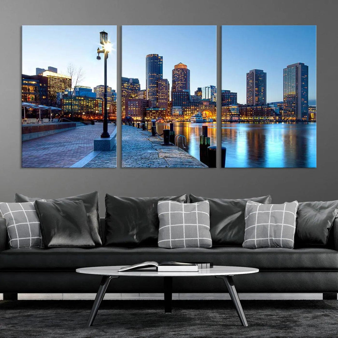 The modern living room features the Boston City Lights Sunrise Skyline Cityscape View Wall Art Canvas Print, crafted with museum-quality canvas and a UV-protective coating.