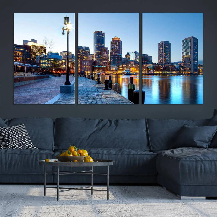 The modern living room features the Boston City Lights Sunrise Skyline Cityscape View Wall Art Canvas Print, crafted with museum-quality canvas and a UV-protective coating.