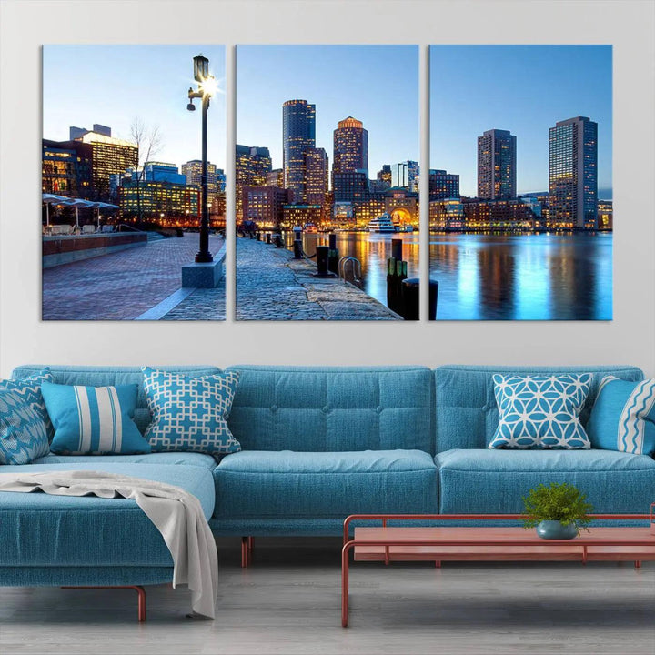 The modern living room features the Boston City Lights Sunrise Skyline Cityscape View Wall Art Canvas Print, crafted with museum-quality canvas and a UV-protective coating.