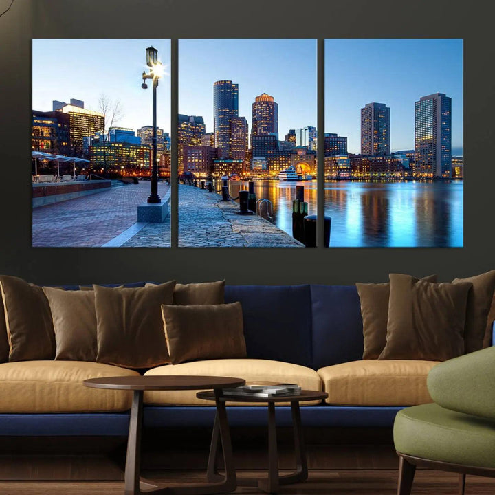 The modern living room features the Boston City Lights Sunrise Skyline Cityscape View Wall Art Canvas Print, crafted with museum-quality canvas and a UV-protective coating.