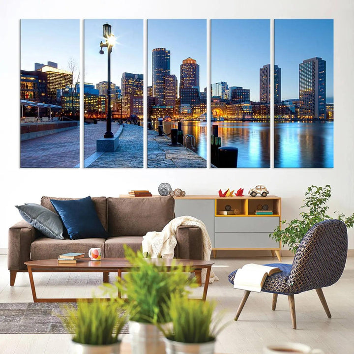 The modern living room features the Boston City Lights Sunrise Skyline Cityscape View Wall Art Canvas Print, crafted with museum-quality canvas and a UV-protective coating.