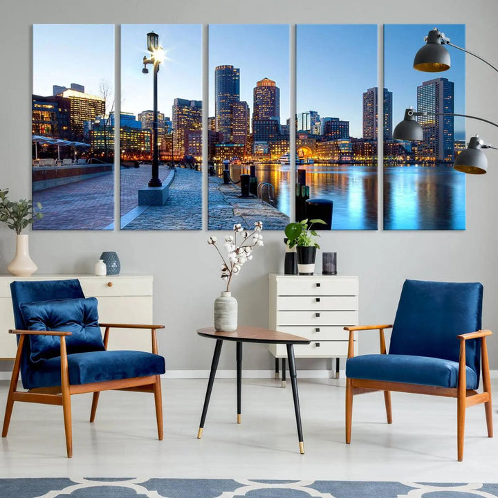 The modern living room features the Boston City Lights Sunrise Skyline Cityscape View Wall Art Canvas Print, crafted with museum-quality canvas and a UV-protective coating.