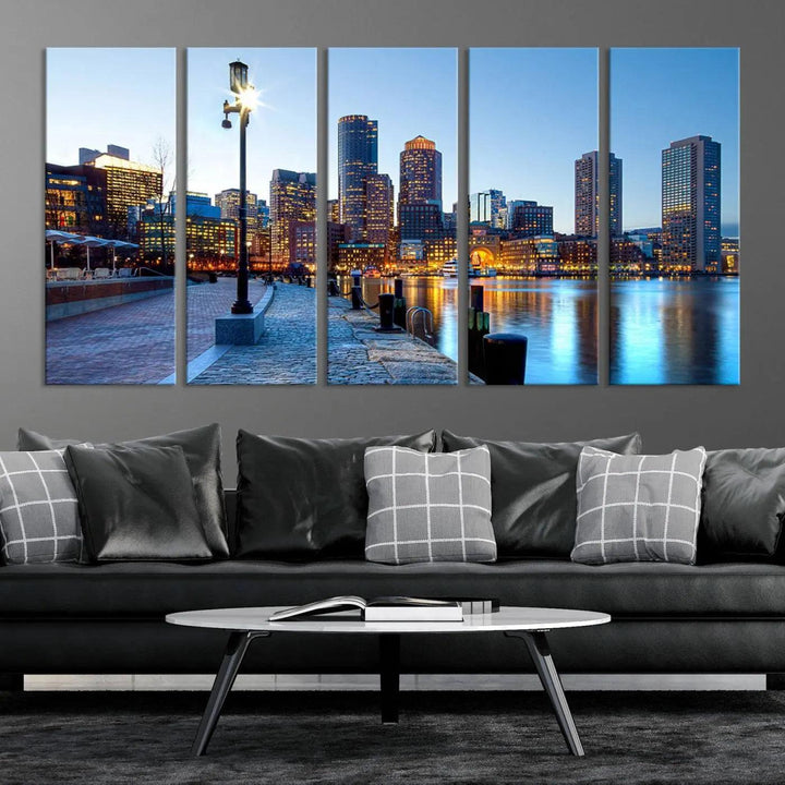 The modern living room features the Boston City Lights Sunrise Skyline Cityscape View Wall Art Canvas Print, crafted with museum-quality canvas and a UV-protective coating.