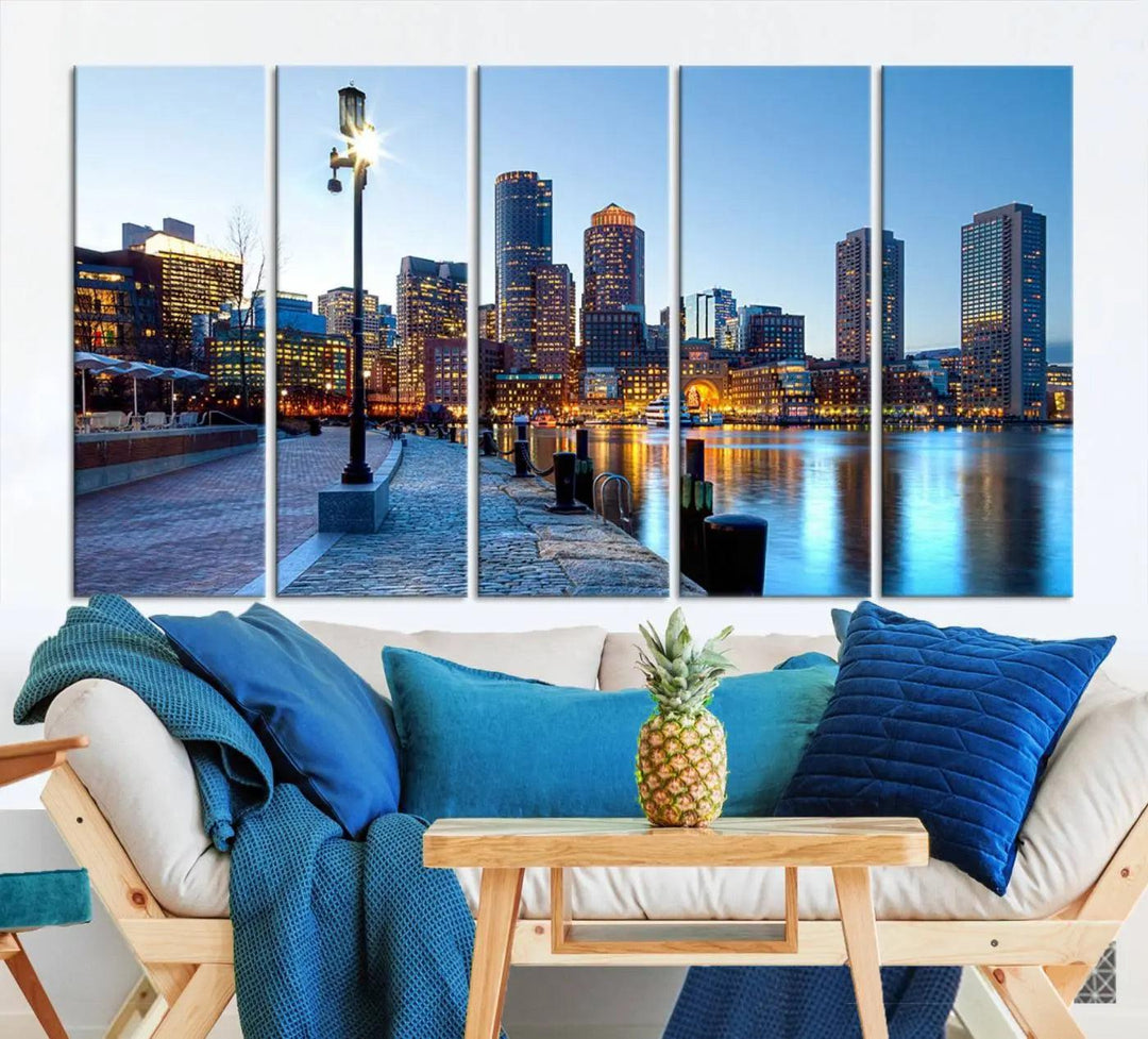 The modern living room features the Boston City Lights Sunrise Skyline Cityscape View Wall Art Canvas Print, crafted with museum-quality canvas and a UV-protective coating.