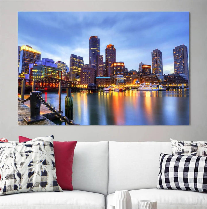 The Boston City Lights Sunset Cloudy Blue Skyline Cityscape View Wall Art Canvas Print embellishes a contemporary living room. This gallery-wrapped canvas set guarantees museum-quality canvases to enhance any space.