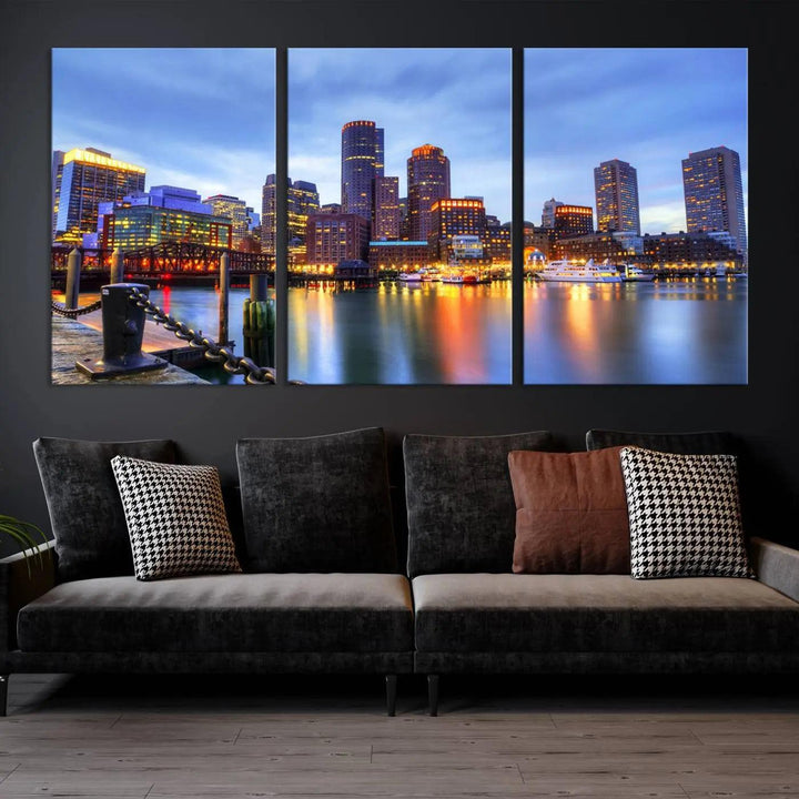 The Boston City Lights Sunset Cloudy Blue Skyline Cityscape View Wall Art Canvas Print embellishes a contemporary living room. This gallery-wrapped canvas set guarantees museum-quality canvases to enhance any space.