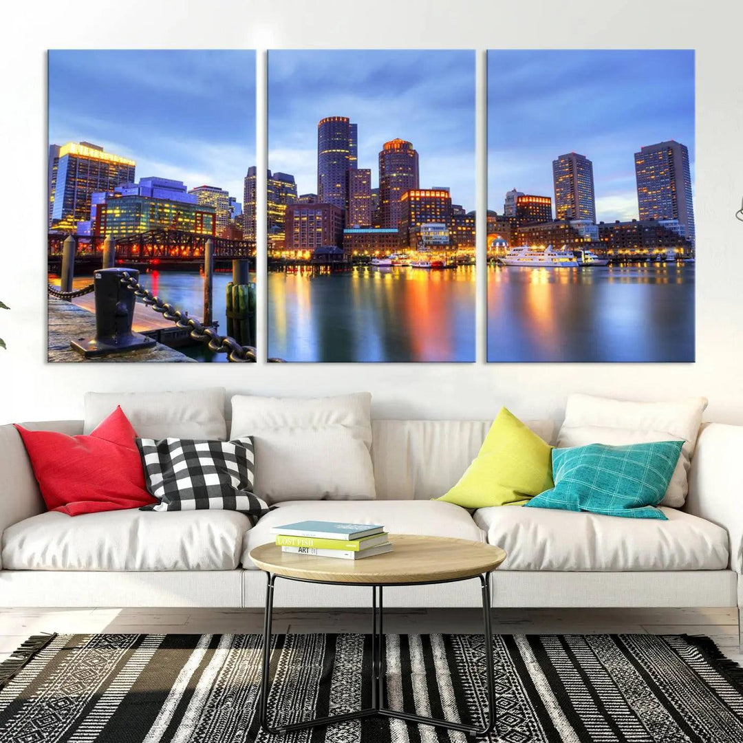 The Boston City Lights Sunset Cloudy Blue Skyline Cityscape View Wall Art Canvas Print embellishes a contemporary living room. This gallery-wrapped canvas set guarantees museum-quality canvases to enhance any space.