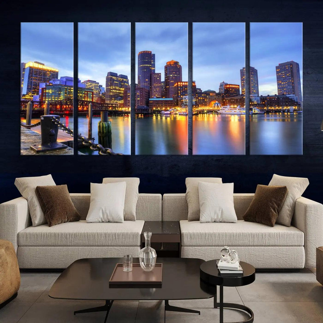 The Boston City Lights Sunset Cloudy Blue Skyline Cityscape View Wall Art Canvas Print embellishes a contemporary living room. This gallery-wrapped canvas set guarantees museum-quality canvases to enhance any space.