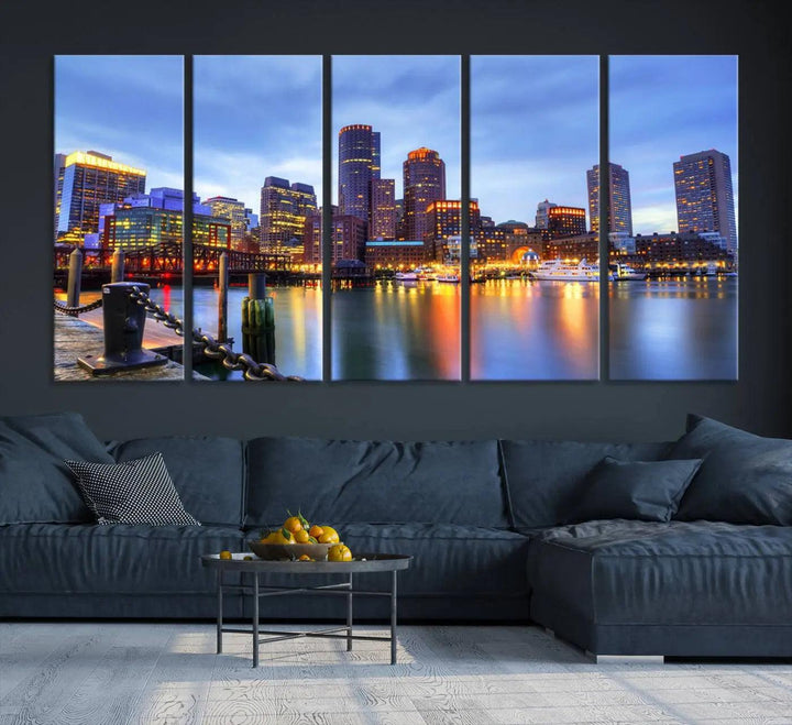 The Boston City Lights Sunset Cloudy Blue Skyline Cityscape View Wall Art Canvas Print embellishes a contemporary living room. This gallery-wrapped canvas set guarantees museum-quality canvases to enhance any space.