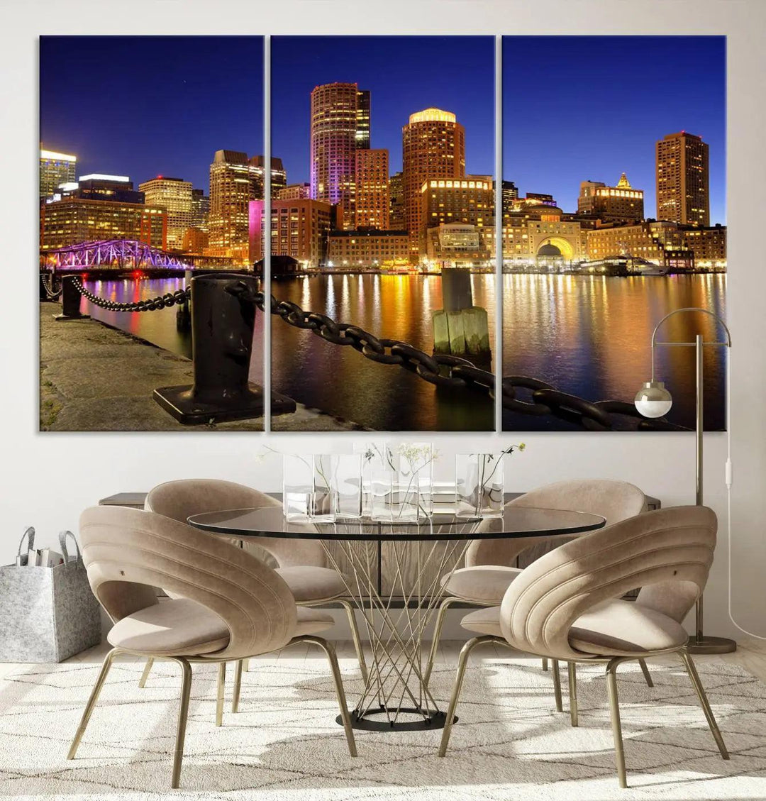 The "Boston City Night Skyline Cityscape View Wall Art Canvas Print" beautifully portrays a stunning triptych of a city skyline illuminated against the night sky, elegantly reflected in the river below. These museum-quality canvases are gallery wrapped to ensure an elegant presentation that enhances any space.