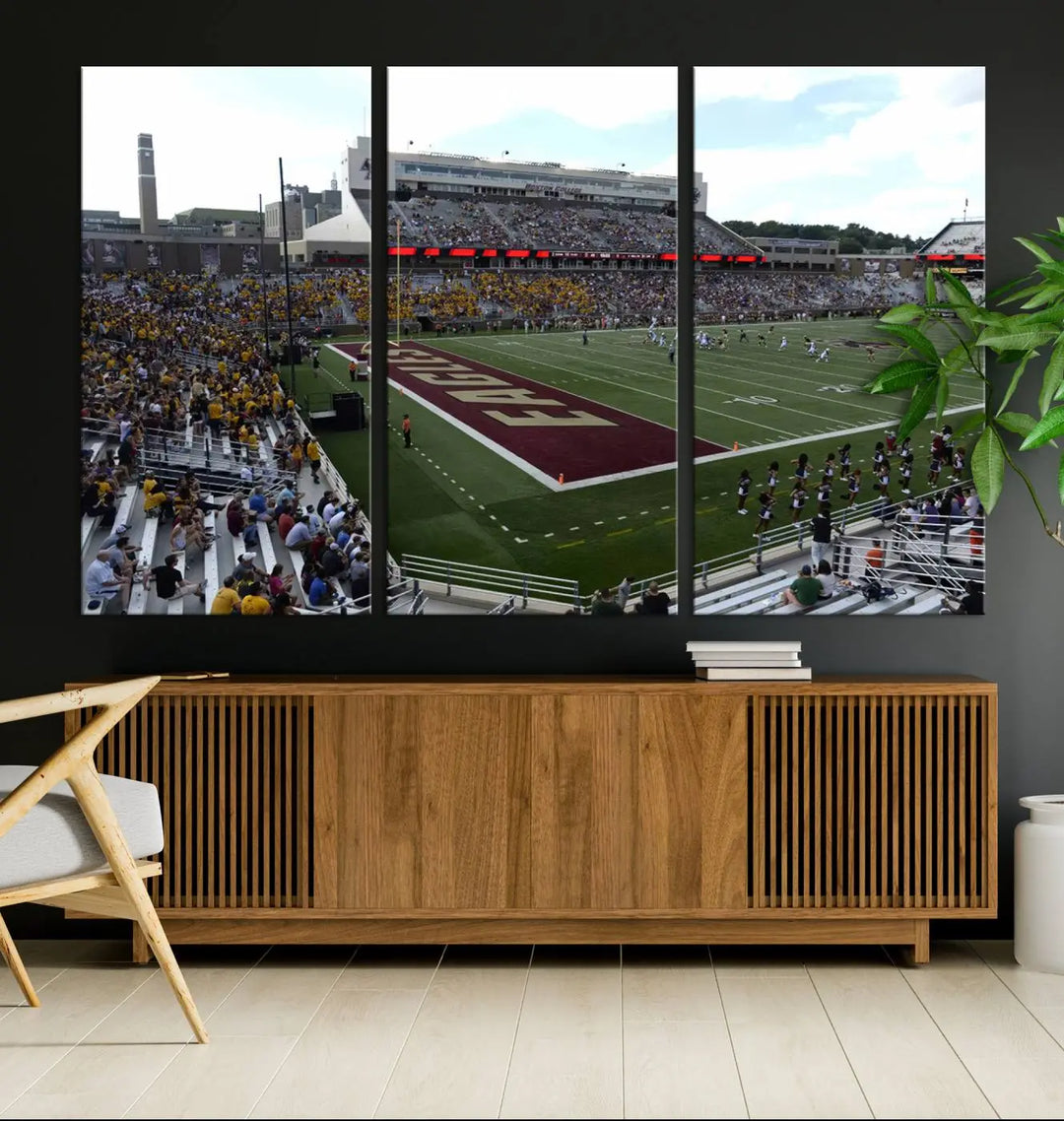 The living room is enhanced by the Boston College Eagles Football Team Print, showcasing a multi-panel wall art of the Boston Alumni Stadium filled with spectators. This piece is crafted on museum-quality canvas using high-resolution printing by a professional craftsman.