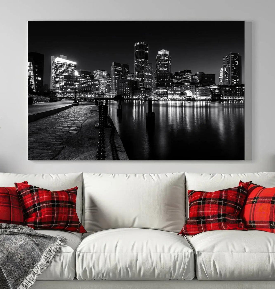 The Boston Lights Skyline Black and White Wall Art Cityscape Canvas Print, crafted with museum-quality canvas and UV-protective coating, serves as a striking triptych centerpiece in the living room.