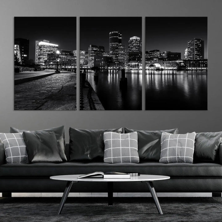 The Boston Lights Skyline Black and White Wall Art Cityscape Canvas Print, crafted with museum-quality canvas and UV-protective coating, serves as a striking triptych centerpiece in the living room.