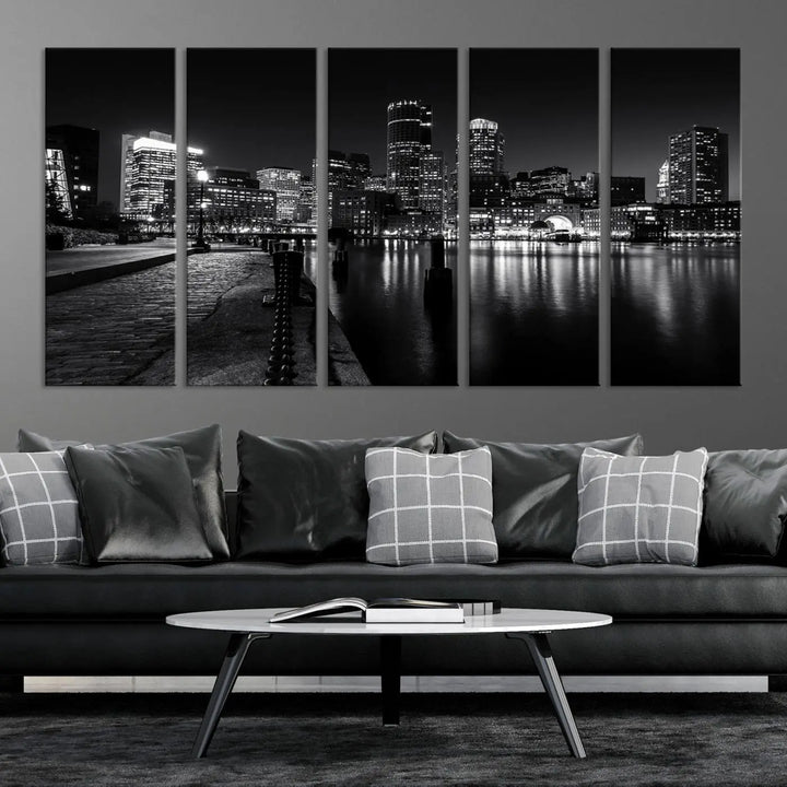 The Boston Lights Skyline Black and White Wall Art Cityscape Canvas Print, crafted with museum-quality canvas and UV-protective coating, serves as a striking triptych centerpiece in the living room.