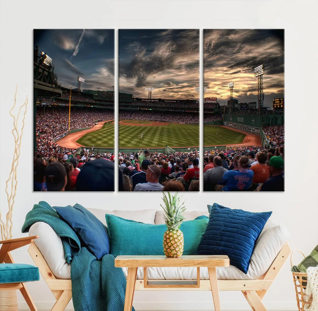 The Boston Red Sox Baseball Team Print, featuring Massachusetts's Fenway Park Stadium, brings charm and a gallery-quality finish to a cozy living room. It captures the essence of a crowded baseball stadium at sunset.