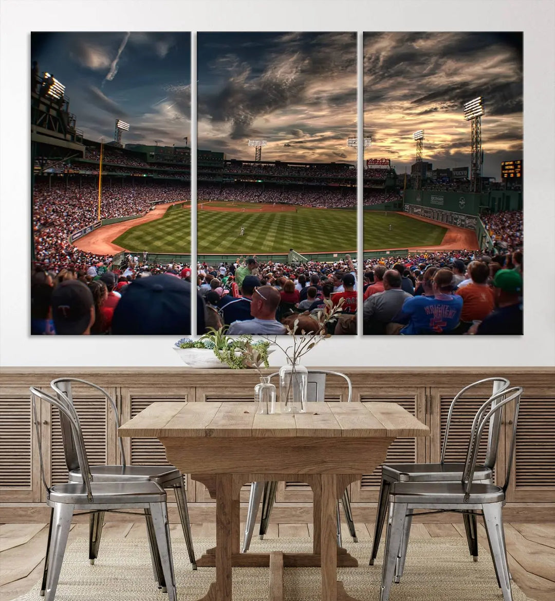 The Boston Red Sox Baseball Team Print, featuring Massachusetts's Fenway Park Stadium, brings charm and a gallery-quality finish to a cozy living room. It captures the essence of a crowded baseball stadium at sunset.